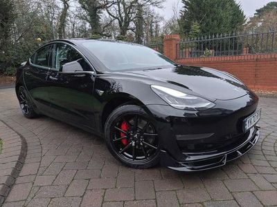 Black Used 2020 Tesla Model 3 Long Range AWD Sedan | £14,470 (A bit pricey)