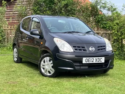 Używany Nissan Pixo Visia 68 KM (50 kW) 2012 Czarny Hatchback