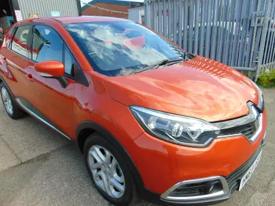 Used Renault Captur Dynamique 90 HP (66 kW) 2013 Orange SUV