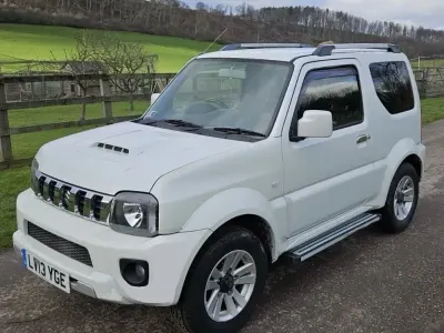 Used Suzuki Jimny SZ4 85 HP (62 kW) 2013 White SUV