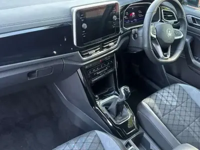 Used VW T-Roc R-line 150 HP (110 kW) 2025 Petrol blue metallic SUV