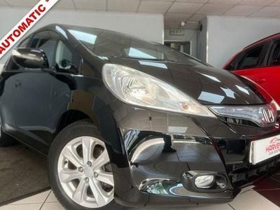 Begagnad Honda Jazz Hybrid 102 HK (75 kW) 2011 Svart Halvkombi