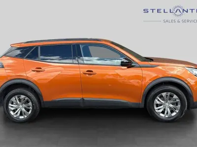 Second-hand Peugeot 2008 Active+ 100 CP (73 kW) 2023 Portocaliu SUV