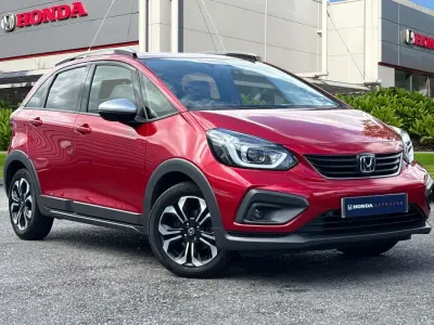Used Honda Jazz Hybrid 109 HP (80 kW) 2023 Premium crystal red Hatchback