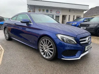 Used Mercedes C220 AMG line 170 HP (125 kW) 2018 Blue Coupe