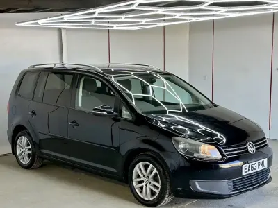 Używany VW Touran SE 105 KM (77 kW) 2013 Czarny Minivan