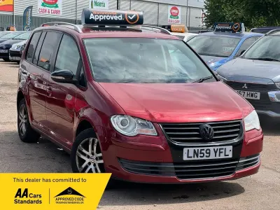 Usado VW Touran SE 138 HP (101 kW) 2009 Vermelho Monovolume