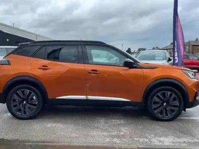 Used Peugeot e-2008 Premium 98 kW (134 HP) 2022 Orange SUV