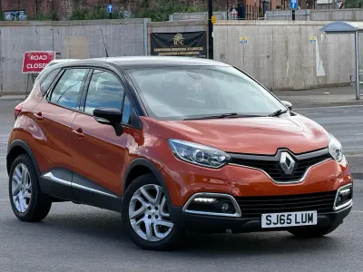 Used Renault Captur Dynamique 90 HP (66 kW) 2015 Orange/black SUV