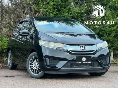 Second-hand Honda Jazz Hybrid 132 CP (97 kW) 2014 Negru Hatchback