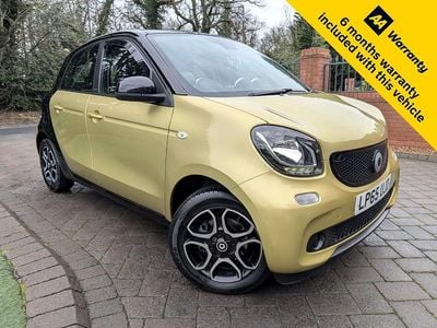 Used Smart ForFour Premium 71 HP (52 kW) 2015 Blacktoyellow Hatchback