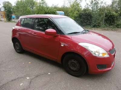 Used Suzuki Swift 75 HP (55 kW) 2011 Monza red mett Hatchback