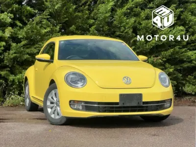 Used VW Beetle Design 105 HP (77 kW) 2012 Yellow Hatchback