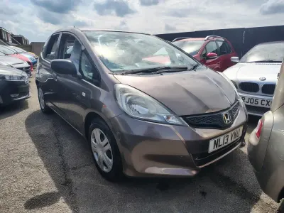 Używany Honda Jazz S 90 KM (66 kW) 2013 Brązowy Hatchback