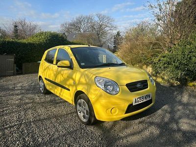 Used Kia Picanto 64 HP (47 kW) 2010 Yellow Hatchback