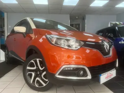 Used Renault Captur Dynamique 90 HP (66 kW) 2014 Orange/cream SUV