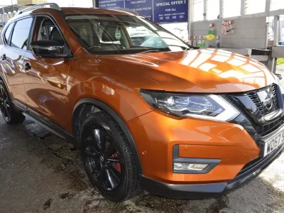 Used Nissan X-Trail Tekna 177 HP (130 kW) 2017 Orange SUV