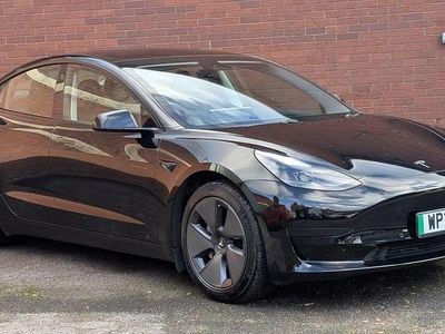 Used 2021 Tesla Model 3 Standard Range Plus Sedan | £15,500 (Fair price)