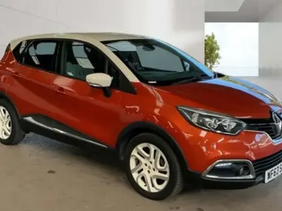 Used Renault Captur Dynamique 90 HP (66 kW) 2013 Orange and cream SUV