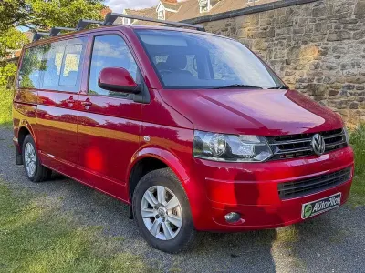 Used VW Caravelle SE 140 HP (102 kW) 2011 Red Van