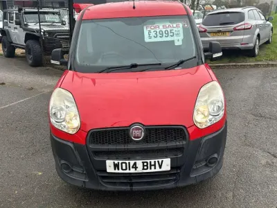 Używany Fiat Doblò 90 KM (66 kW) 2014 Czerwony Minivan