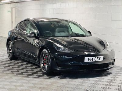 Black Used 2020 Tesla Model 3 Standard Range Sedan | £8,989 (A bit pricey)