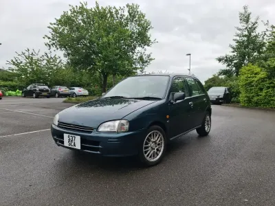 Used Toyota Starlet 75 HP (55 kW) 1998 Green Hatchback