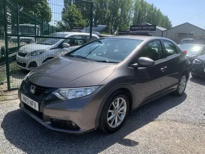 Używany Honda Civic ES 150 KM (110 kW) 2012 Brązowy Hatchback