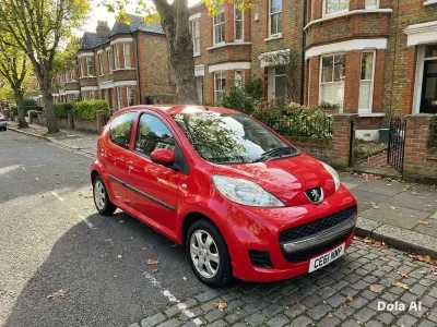 Used Peugeot 107 68 HP (50 kW) 2011 Red Hatchback