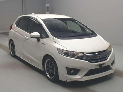 Used Honda Jazz Hybrid 134 HP (98 kW) 2013 White Hatchback