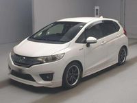Used Honda Jazz Hybrid 134 HP (98 kW) 2013 White Hatchback