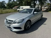Used Mercedes E220 AMG line 177 HP (130 kW) 2015 Silver Coupe