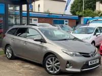 Used Toyota Auris Hybrid 136 HP (100 kW) 2014 Bronze Estate