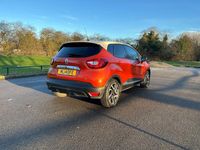 Used Renault Captur Dynamique 90 HP (66 kW) 2014 Orange/cream SUV