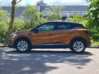 Second-hand Renault Captur Iconic 100 CP (73 kW) 2020 Portocaliu SUV