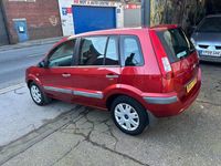 Used Ford Fusion Style 79 HP (58 kW) 2007 Orange Hatchback