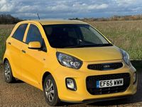 Used Kia Picanto 68 HP (50 kW) 2016 Yellow Hatchback