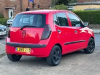 Usado Hyundai i10 Classic 78 HP (57 kW) 2010 Vermelho Citadino