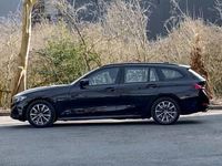 Used BMW 330e Sport Line 292 HP (214 kW) 2023 Black Estate