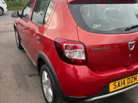 Used Dacia Sandero Ambiance 90 HP (66 kW) 2014 Red Hatchback