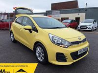 Used Kia Rio 84 HP (61 kW) 2015 Yellow Hatchback