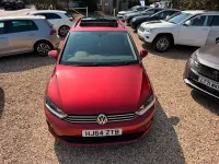 Used VW Golf Sportsvan SE 125 HP (91 kW) 2014 Red with dark interior trim MPV
