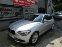 Używany BMW 118 Sport Line 143 KM (105 kW) 2011 Srebrny Hatchback