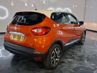 Used Renault Captur Dynamique 120 HP (88 kW) 2015 Orange/cream SUV