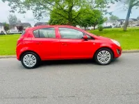 Second-hand Vauxhall Corsa 84 CP (61 kW) 2013 Roșu Hatchback