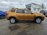 Second-hand Dacia Duster Comfort 114 CP (83 kW) 2018 Portocaliu SUV