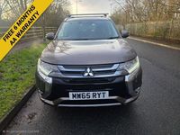 Used Mitsubishi Outlander P-HEV 200 HP (147 kW) 2015 Brown SUV
