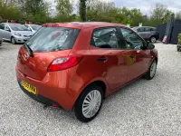 Usado Mazda 2 75 HP (55 kW) 2009 Laranja Citadino