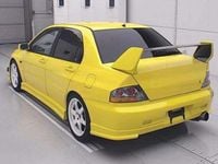 Used Mitsubishi Lancer 276 HP (202 kW) 2003 Yellow Sedan