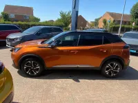 Used Peugeot e-2008 GT 98 kW (134 HP) 2023 Orange SUV